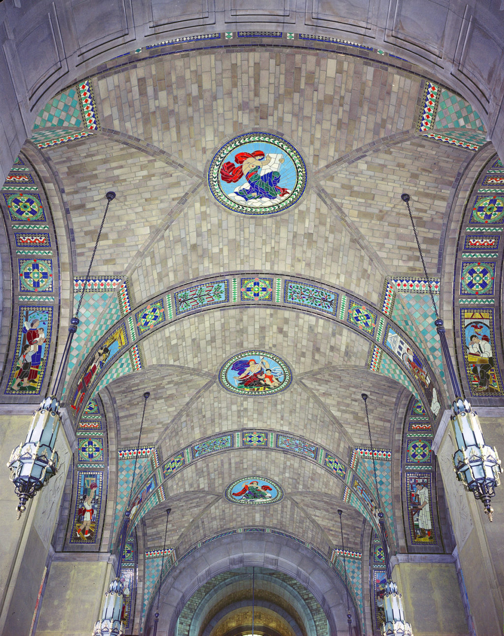 The foyer ceiling with mosaics of the activities of society.